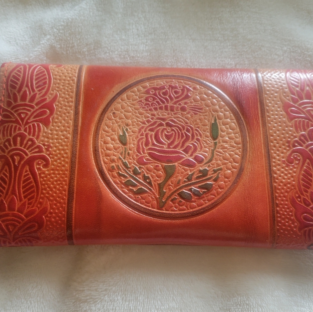 It Is 8 Inches wide and 4 inches high, and brown,cream and beige